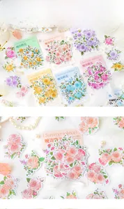 Detailed view of aesthetic watercolor flower stickers with rose and petal motifs