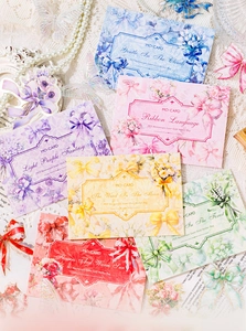 Detailed flat lay of PET stickers with laser gold foil floral and ribbon patterns