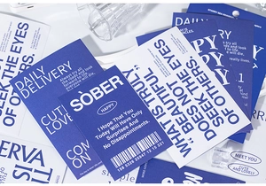 Detailed flat lay of modern minimalist blue and white aesthetic decorative journal stickers