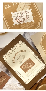 Macro detail of vintage French bakery themed decorative stickers for journals