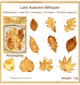 Detailaufnahme der herbstlichen Blattaufkleber mit Goldfolie auf hochwertigem Schreibpapier