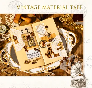 Detail of vintage scrapbook stickers featuring hourglass, piano, and label designs