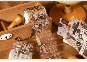 Detailed view of vintage aesthetic PET tape featuring piano motifs and music scores