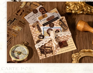 Detailed vintage scrapbook stickers featuring old clocks, compasses, and lace ribbons