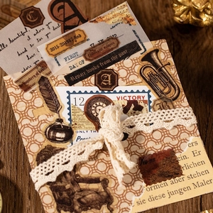 Vintage scrapbooking sticker set with quill, saxophone and antique newspaper motifs