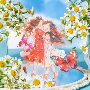 Glittery butterfly girl stickers set with floral dresses on a daisy background