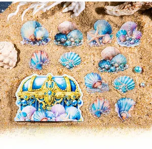 Macro shot of seashell and treasure chest stickers with pearl finish on coral background