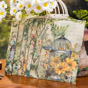 Vintage forest birds decorative papers for DIY journaling on rustic wooden surface