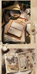 Macro view of vintage burnt-edge paper stickers for scrapbooking with butterfly motifs