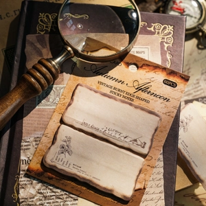 Vintage burnt-edge sticky notes with botanical prints and retro French script for scrapbooking