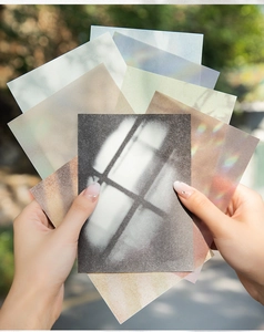 Artistic translucent scrapbooking paper set with soft light and shadow patterns