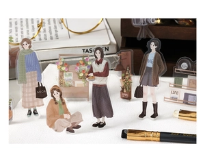 Détail artistique d'autocollants PET vintage avec illustrations de mode et décorations