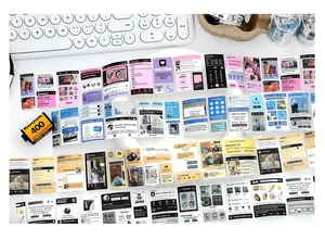 Detailed view of translucent washi tape with smartphone UI design on a white desk