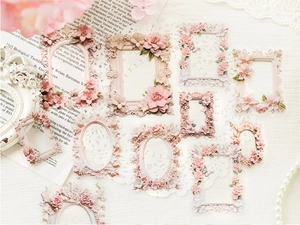 Detalle macro de pegatinas de marcos florales vintage 3D para diario y manualidades