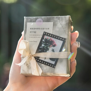Artistic light and shadow scrapbook paper with grey marble textures and ribbon ties