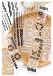 Detailed macro view of vintage PET lace stickers with retro frame patterns on cork tray