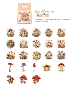Flat lay of 46 embroidery style mushroom stickers for vintage scrapbooking and journals