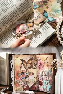 Detail of vintage scrapbooking stickers featuring butterflies and floral oil painting art