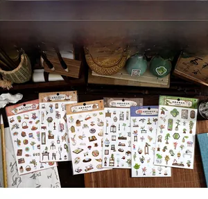 Close-up of vintage Chinese style stickers featuring bonsai and antique furniture elements