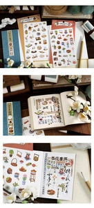 Detailed close-up of retro Chinese style stickers with teaware and pastry illustrations