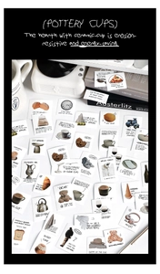 Detail of artistic hand-drawn lifestyle stickers on matte white cardstock for DIY journals