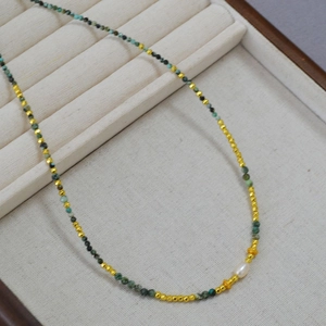 Retro turquoise beaded necklace with gold spacers and white freshwater pearl drop