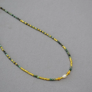 Retro beaded necklace with turquoise stones, gold spacer beads and freshwater pearl