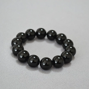 Bracelet extensible chic en agate noire 14mm avec perles rondes polies et brillantes