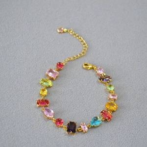 Colorful geometric glass gemstone bracelet with gold chain and adjustable lobster clasp