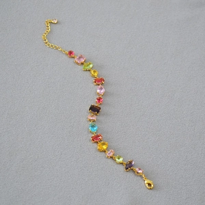 Colorful geometric gemstone gold bracelet with faceted crystals and adjustable chain