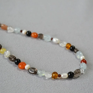 Irregular natural stone and pearl beaded necklace with colorful mixed gemstones