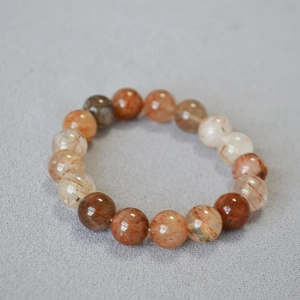 Retro 10mm red rutilated quartz beaded bracelet with natural crystal textures