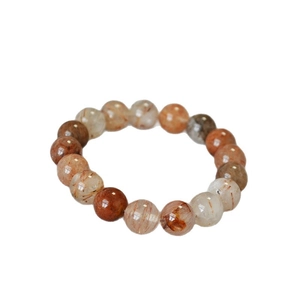 Traditional 10mm red rutilated quartz beaded bracelet with natural mineral inclusions