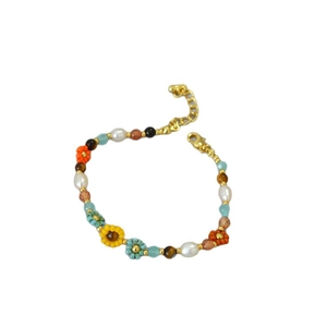 Bohemian beaded sunflower bracelet with colorful pearls and floral woven details