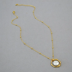 Golden irregular geometric ring necklace with baroque freshwater pearl pendant and bead chain