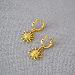 Minimalist sun pendant gold plated earrings featuring personified sun faces and hoop charms
