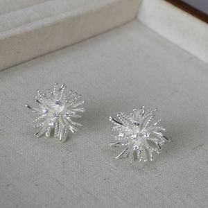 S925 silver starburst stud earrings featuring brilliant fireworks design and cubic zirconia