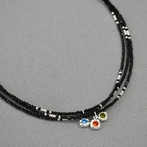 Three-layer black spinel beaded necklace with colorful round zircon charms in silver setting