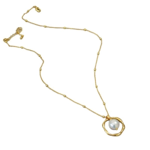 Irregular golden geometric ring necklace featuring a white baroque freshwater pearl pendant