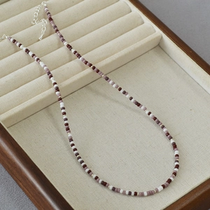 Elegant bohemian handmade beaded necklace with red and purple Miyuki beads and silver chain