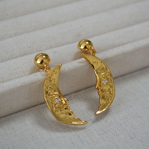 Vintage brass gold-plated crescent moon stud earrings with zircon eyes and textured finish