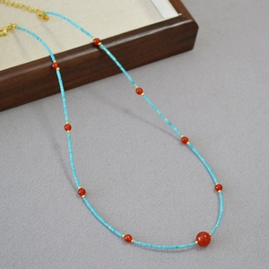 Minimalist turquoise tube beads necklace with red agate accents and gold lobster clasp