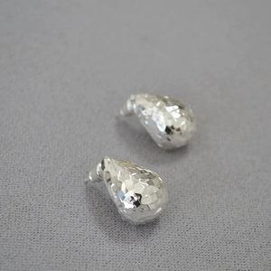 Water-drop stud earrings with silver metal faceted dragon scale texture in minimalist style