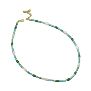 Elegant beaded necklace with turquoise, shell pearls, and gold spacers on white background