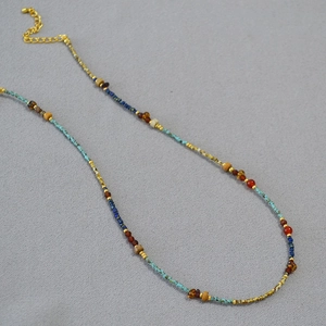 French vintage necklace with turquoise and red beads featuring gold extension chain