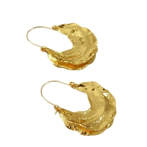 Golden irregular lava texture crescent hoop earrings with hammered wave finish