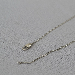 Sleek silver stainless steel Cuban link necklace with lobster clasp and adjustable chain