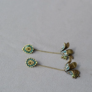 Bohemian floral tassel drop earrings in vintage brass with blue stone accents