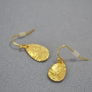 Handmade hammered gold leaf teardrop earrings in irregular brass design for women