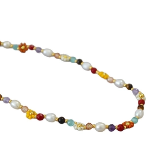 Handmade necklace with colorful daisy beads, freshwater pearls and golden accents